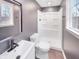Modern bathroom boasts a sleek vanity, framed mirror, and a walk-in shower, perfect for relaxation at 9318 Drawbridge Ct, Indianapolis, IN 46250