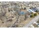 Birds eye view of a neighborhood with tennis courts, a playground, paved walking paths, and single-Gathering homes at 10120 Youngwood Ln, Fishers, IN 46038