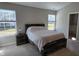 Bright and airy bedroom with large windows and a spacious layout, featuring neutral decor at 10645 Aspen Dr, Fishers, IN 46037