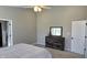 Cozy bedroom featuring neutral paint, a ceiling fan, and modern furnishings at 10645 Aspen Dr, Fishers, IN 46037