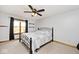 A cozy bedroom with a simple iron frame bed, providing a comfortable and inviting space to relax and unwind at 10651 E County Road 600 N, Indianapolis, IN 46234