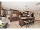 Spacious kitchen features a large island, granite countertops, stainless steel appliances, and ample cabinet space at 10651 E County Road 600 N, Indianapolis, IN 46234
