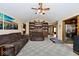 Expansive living room featuring high ceilings, a built-in bookcase, and comfortable seating at 10651 E County Road 600 N, Indianapolis, IN 46234