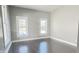Bright room with hardwood floors, gray walls and natural light at 1206 Dawson St, Indianapolis, IN 46203