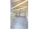 Wide angle view of the garage showing a painted interior and overhead structure at 1206 Dawson St, Indianapolis, IN 46203