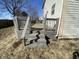 Back deck featuring stairs with a view of the yard, providing a serene outdoor space at 12151 Bearsdale Dr, Indianapolis, IN 46235