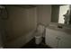 A functional bathroom equipped with a standard tub and shower combination and vanity at 12151 Bearsdale Dr, Indianapolis, IN 46235