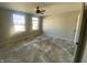 Bedroom ready for renovation with large windows, ample natural light, and neutral walls at 12151 Bearsdale Dr, Indianapolis, IN 46235