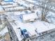 Aerial view of home in winter with spacious yard and private driveway at 1239 Brooks St, Indianapolis, IN 46202