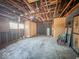 This basement features unfinished walls, concrete flooring, and exposed utilities at 1239 Brooks St, Indianapolis, IN 46202