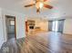 Spacious living room with stone fireplace and sliding glass doors to the backyard at 1239 Brooks St, Indianapolis, IN 46202
