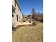 A backyard patio with a pergola overlooking lawn and landscaping at 12461 Hawks Landing Dr, Fishers, IN 46037