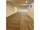 An unfinished basement with carpeting, ready to be customized to your needs at 12461 Hawks Landing Dr, Fishers, IN 46037