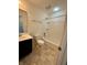 A clean bathroom featuring a toilet, vanity with sink, and a tub/shower combo at 12461 Hawks Landing Dr, Fishers, IN 46037
