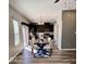 Dining room with seating for six that is connected to the kitchen with dark wood cabinetry at 12461 Hawks Landing Dr, Fishers, IN 46037