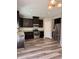 Spacious kitchen with stainless steel appliances and dark wood cabinetry at 12461 Hawks Landing Dr, Fishers, IN 46037