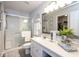 Clean and modern bathroom with a glass-enclosed shower and stylish vanity, providing a relaxing spa-like experience at 13414 Allegiance Dr, Fishers, IN 46037