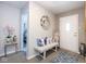 Inviting entryway featuring stylish decor, comfortable seating, and a bright, welcoming atmosphere at 13414 Allegiance Dr, Fishers, IN 46037