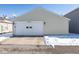Detached two-car garage with a clean white door and a well-maintained driveway at 13414 Allegiance Dr, Fishers, IN 46037