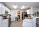 Well-equipped kitchen with modern appliances and ample counter space, perfect for culinary enthusiasts at 13414 Allegiance Dr, Fishers, IN 46037