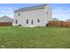 Picture of the home's spacious backyard featuring a patio and lush green grass at 13860 N Tiosa Ln, Camby, IN 46113