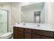 Bathroom featuring a double sink vanity and a glass door shower at 13860 N Tiosa Ln, Camby, IN 46113