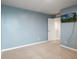 Bedroom showing carpet, a door and a mounted TV on the wall at 13860 N Tiosa Ln, Camby, IN 46113