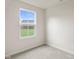 Cozy bedroom featuring a large window with a view of the fenced backyard at 13860 N Tiosa Ln, Camby, IN 46113