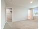 Large bedroom featuring neutral carpet and lots of natural light at 13860 N Tiosa Ln, Camby, IN 46113