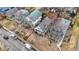 An aerial view of a neighborhood showing homes, streets, and mature trees at 139 S Ritter Ave, Indianapolis, IN 46219