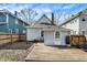 Back of home showing a wooden deck and updated siding at 139 S Ritter Ave, Indianapolis, IN 46219