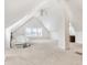 Spacious bonus room with ample lighting, carpeted floors, and versatile layout options at 139 S Ritter Ave, Indianapolis, IN 46219