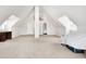 Versatile bonus room space featuring carpet, a white brick column, and potential for customization at 139 S Ritter Ave, Indianapolis, IN 46219