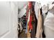 Walk-in closet with organized storage and a variety of clothing at 139 S Ritter Ave, Indianapolis, IN 46219