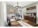 Cozy dining room features an antique buffet and modern lighting fixture at 139 S Ritter Ave, Indianapolis, IN 46219