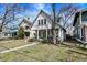 Quaint home with a cozy front porch, mature trees, and inviting curb appeal in a quiet neighborhood at 139 S Ritter Ave, Indianapolis, IN 46219