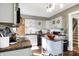 Modern kitchen features dark countertops, stainless appliances, and white cabinets at 139 S Ritter Ave, Indianapolis, IN 46219