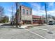 A historic brick building at a street corner, featuring a mix of architectural styles and neighborhood charm at 139 S Ritter Ave, Indianapolis, IN 46219