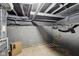 Spacious unfinished basement with pipes, painted beams, and tile floor at 1413 S East St, Indianapolis, IN 46225