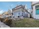 View of house featuring upper deck and some greenery at 1413 S East St, Indianapolis, IN 46225