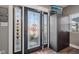 Charming foyer featuring a decorative glass front door and convenient storage at 1413 S East St, Indianapolis, IN 46225