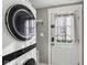 Modern laundry area with sleek appliances and functional door at 1413 S East St, Indianapolis, IN 46225