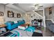Bright living room showcasing a piano, modern furniture, and stylish accents at 1413 S East St, Indianapolis, IN 46225