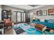 Cozy living room with comfortable seating, modern decor, and a stylish front door at 1413 S East St, Indianapolis, IN 46225