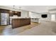 Finished basement with a kitchen featuring stainless steel appliances and modern finishes at 15745 Market Center Dr, Carmel, IN 46033