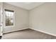 Bedroom with neutral carpet, a large window, and soft natural light at 15745 Market Center Dr, Carmel, IN 46033