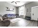 Bright, inviting living room featuring comfortable seating, a large window, and stylish decor at 163 Country Wood Dr, Whiteland, IN 46184