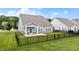 Backyard featuring a well-manicured lawn and black aluminum fence at 16401 Brigham Ln, Westfield, IN 46074