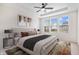 Cozy main bedroom featuring a tray ceiling, neutral tones, and bright natural light at 16401 Brigham Ln, Westfield, IN 46074