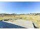 Expansive backyard featuring a wooden deck and endless possibilities for outdoor activities and serene relaxation under the open sky at 22569 State Road 37 N, Noblesville, IN 46060